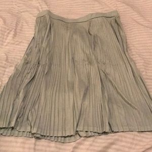 Mint color pleated skirt with elastic waist.